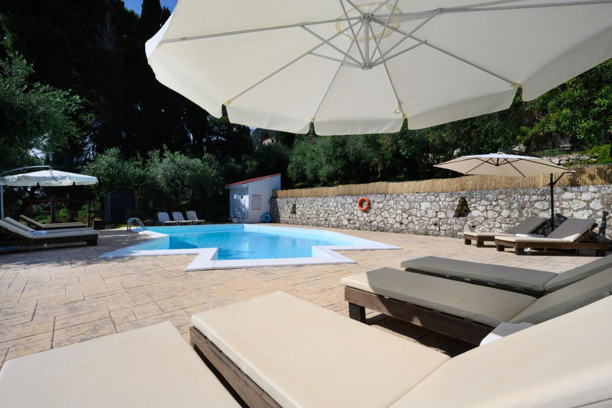 Olive Grove Poolside Apartments Benitses  Eksteriør bilde